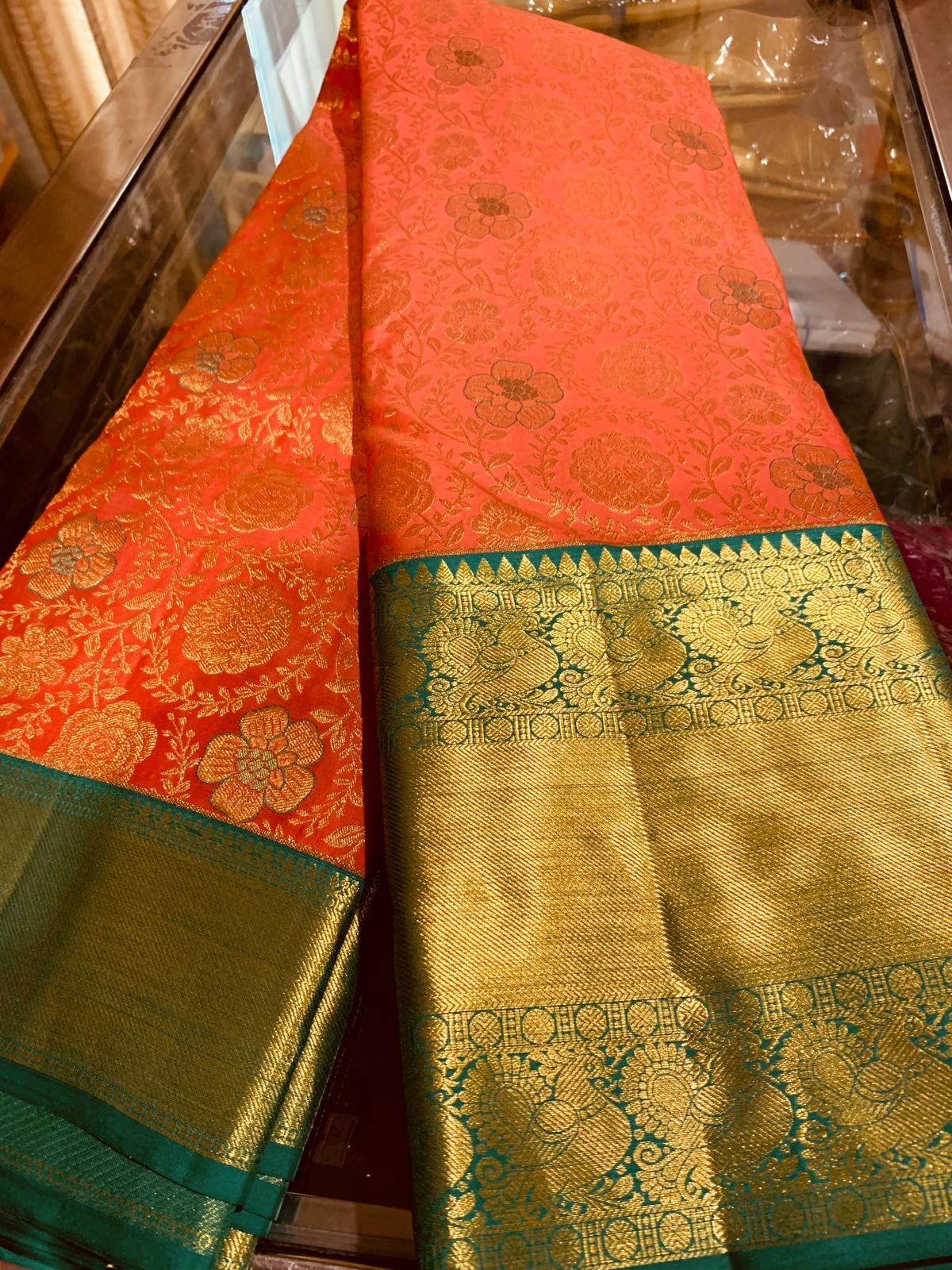 Bridal Peachy Orange Saree with Green & Gold Zari | SPK009